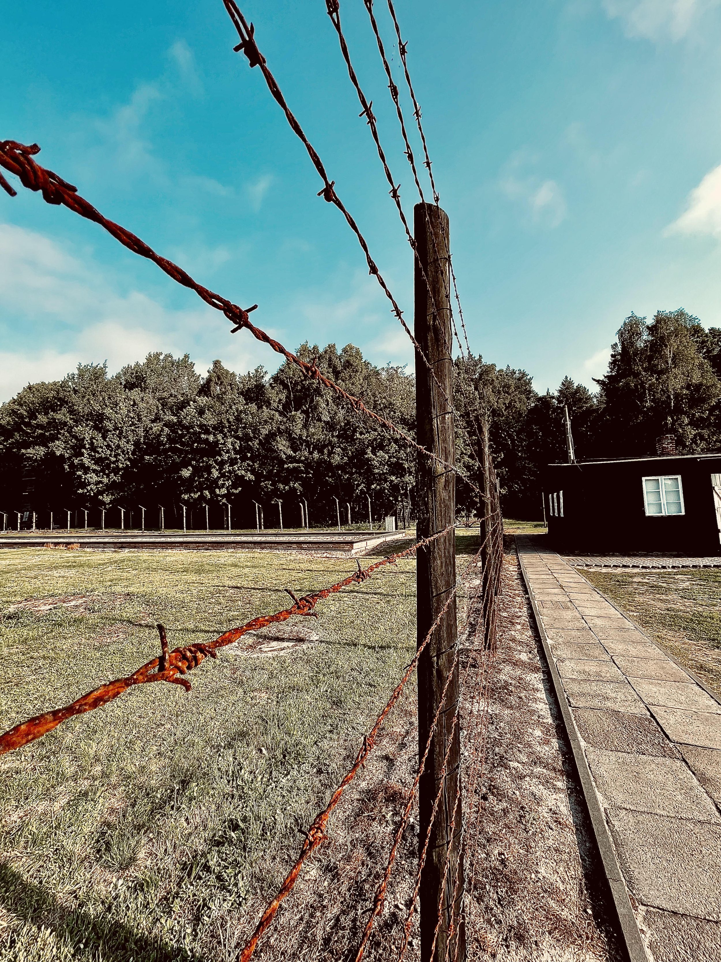 The barbed wire that separated the commandant's office from the prisoners