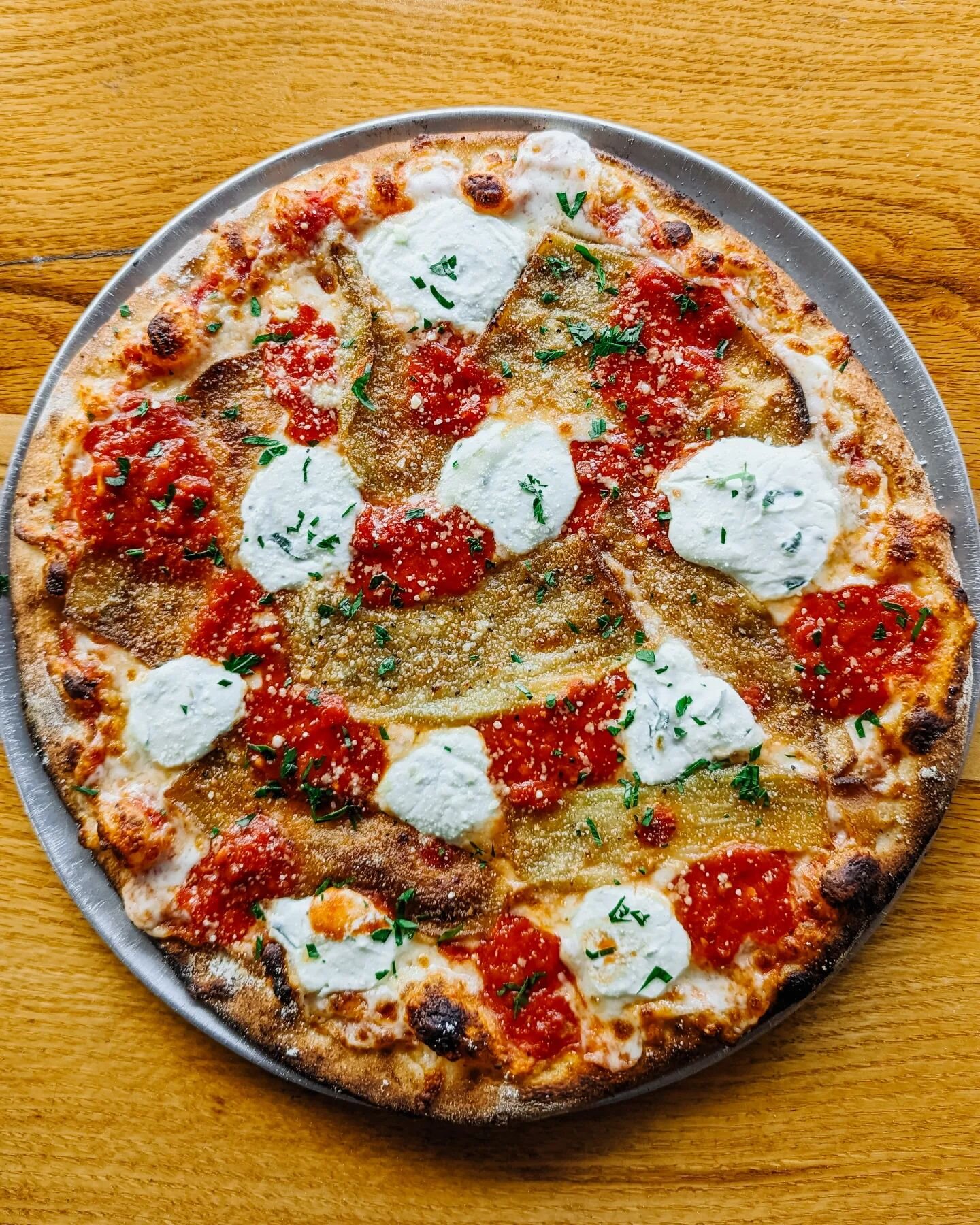 happy national pizza month 🍕 just in time for a new seasonal pie!
.
.
introducing our fall lineup!

last up➝🍆 the parm parm
hand-crushed tomato sauce, mozzarella, fried eggplant &amp; dollops of herbed ricotta &amp; momma's marinara. then we take o