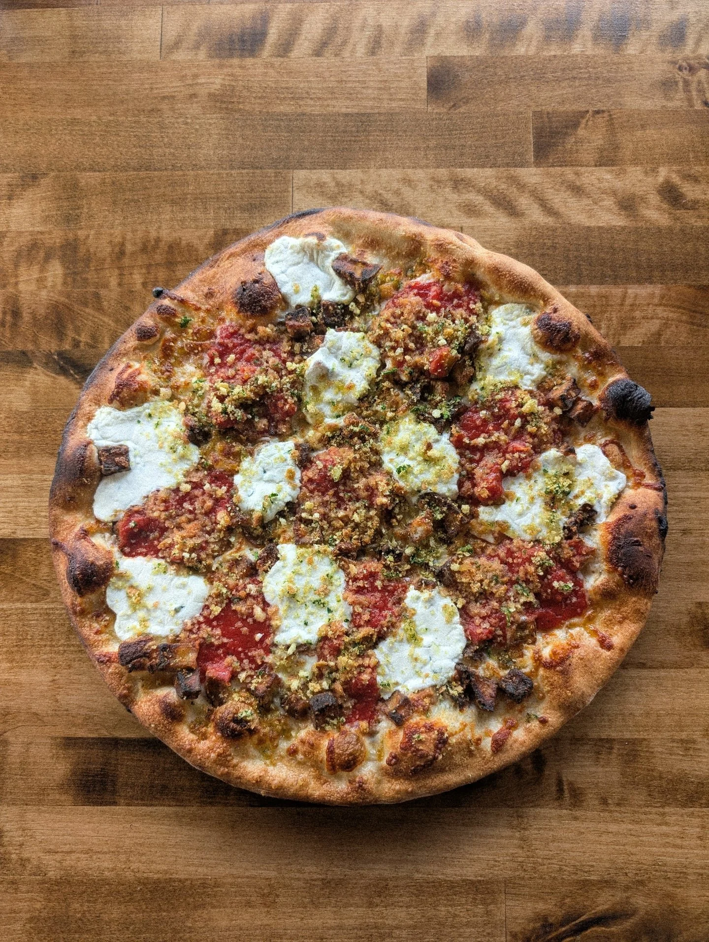 THE PARM PARM 🍆 

Tomato sauce, mozzarella, fried eggplant &amp; dollops of herbed ricotta &amp; our momma's marinara. then we take our seasoned wood fired croutons, crush them up, add some parsley &amp; sprinkle them on top!

More fall specials com