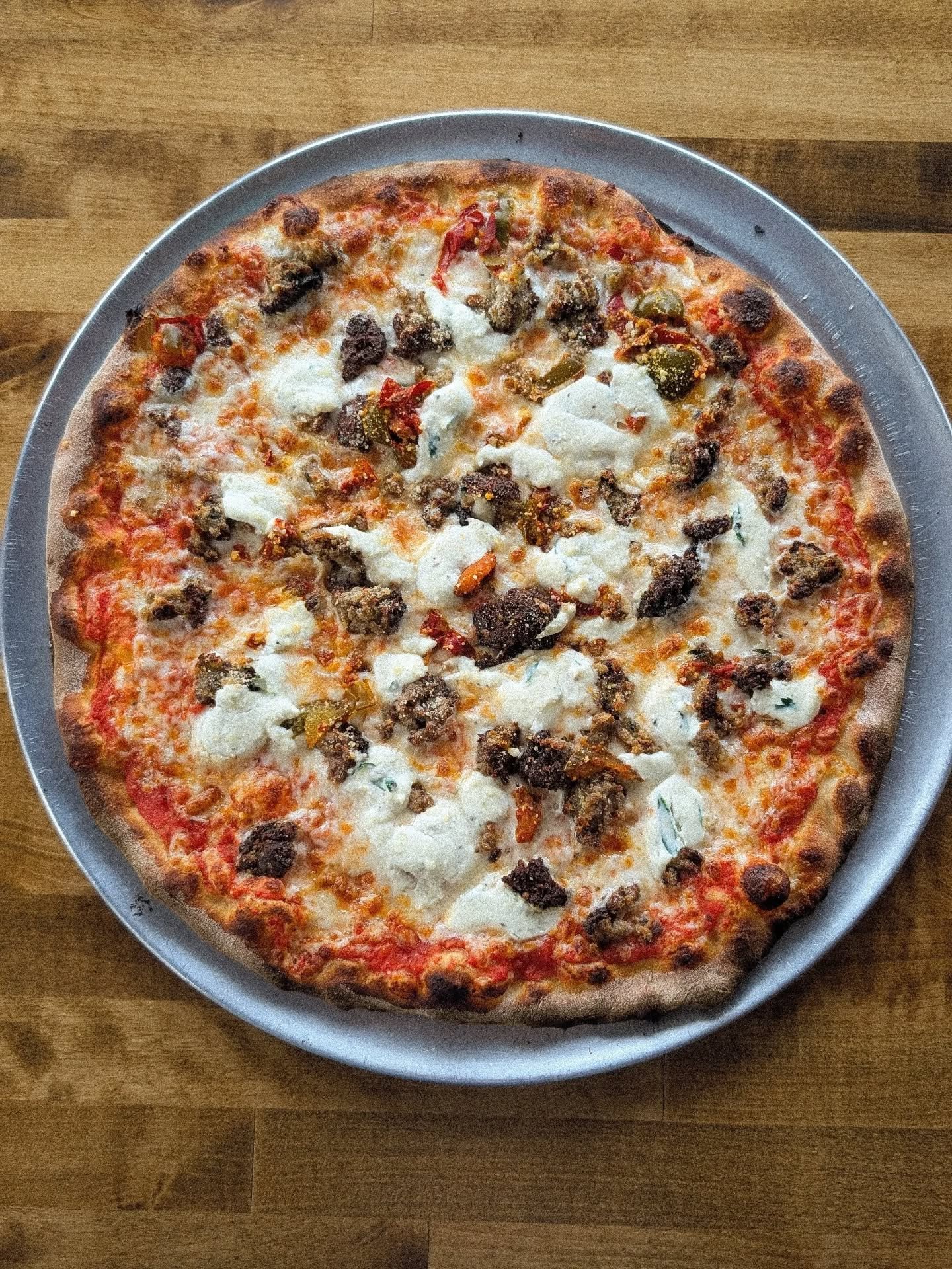 who's tried this one?!

🍝BREAKING MY MEATBALLS- 
crushed tomato sauce, mozz, gram's meatballs, herbed ricotta and hot cherry peppers.

my grandma's meatballs have been our family's favorite for years and years. so when the menu was being planned out