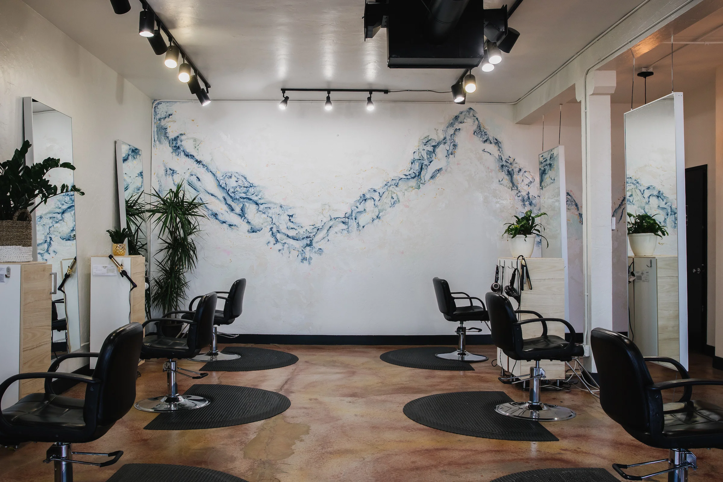Abstract watercolor mural at Hair Drezzers on Fire . Photo by: S tacy Keck
