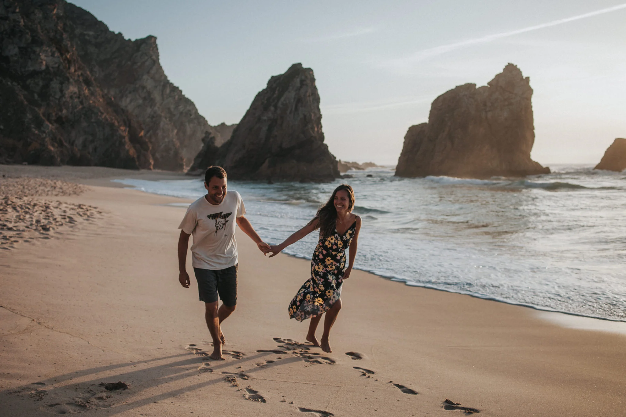 Couple walking at the beach