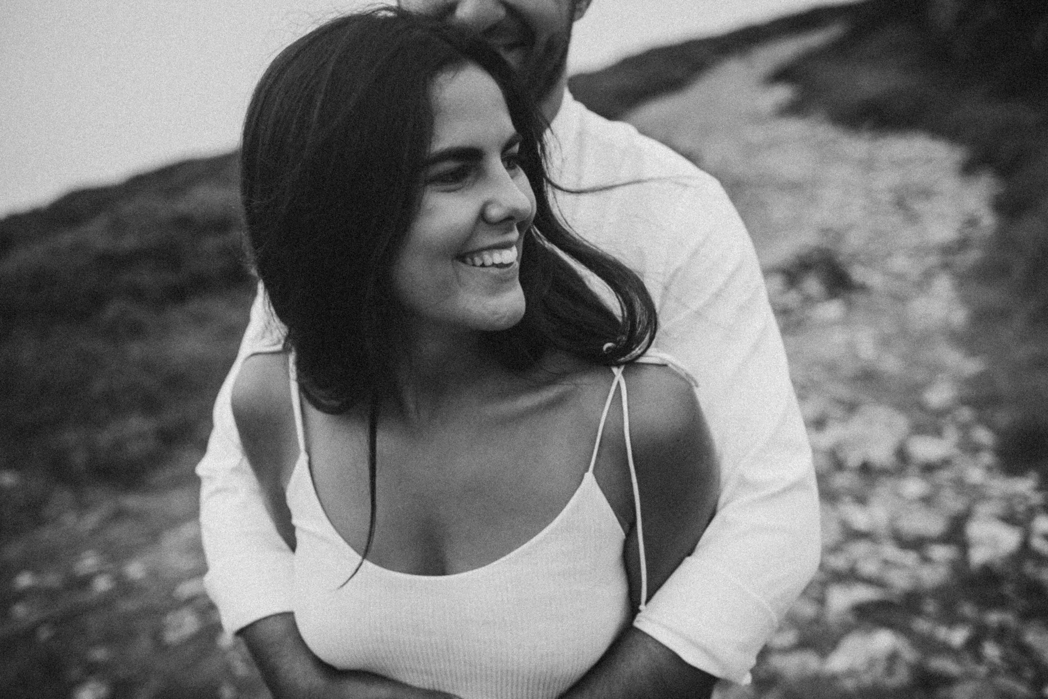 Man hugges his girlfriend