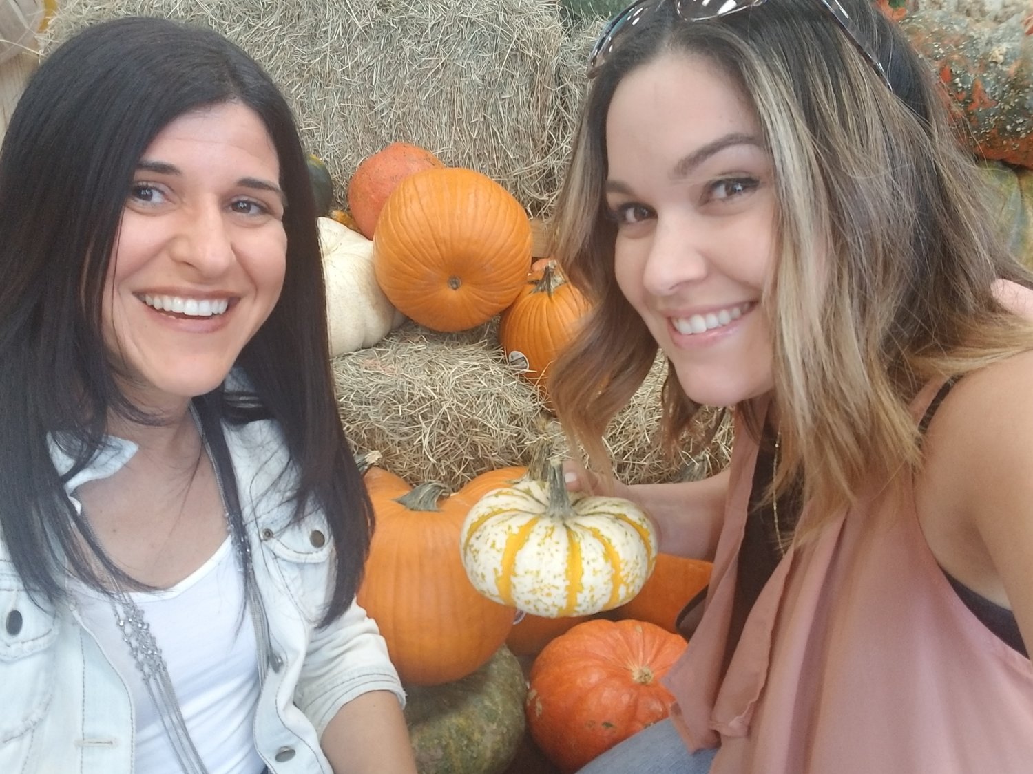 A little free photo session at the pumpkin patch, aka Trader Joe’s. There weren’t any other pumpkin patches open the day we went, so we went to the next best thing. The pictures we took are priceless and well, looks like we’re at a pumpkin patch.