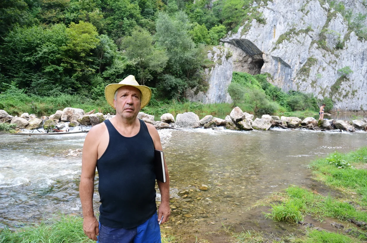 Zoran at Jerma River with Dam Project in Background, 2014