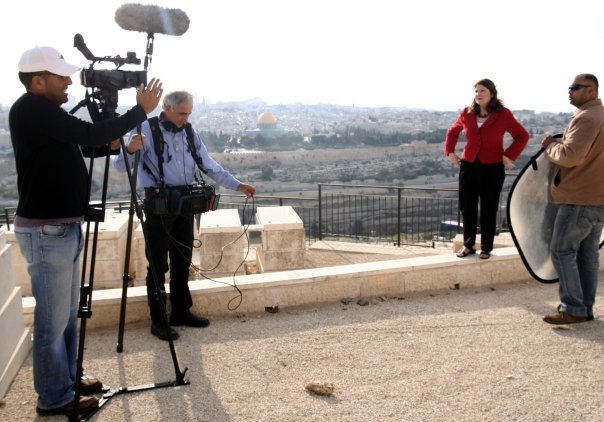 Kim Lawton doing a standup in Jerusalem