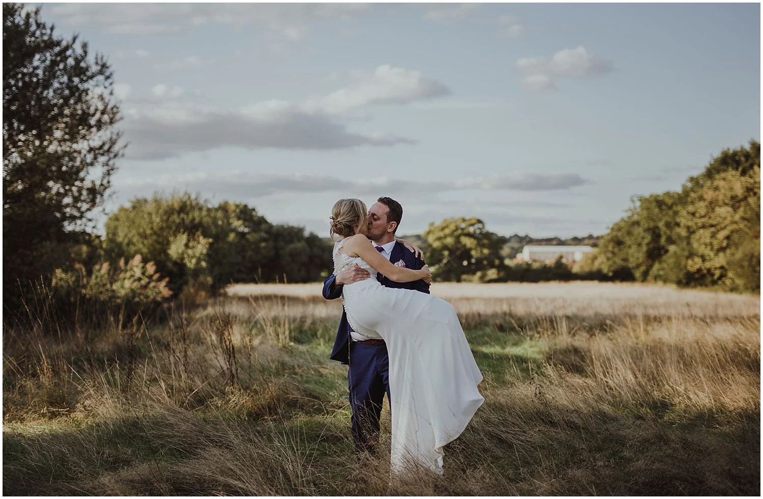 Golden hour wedding photo at Smallfield Place