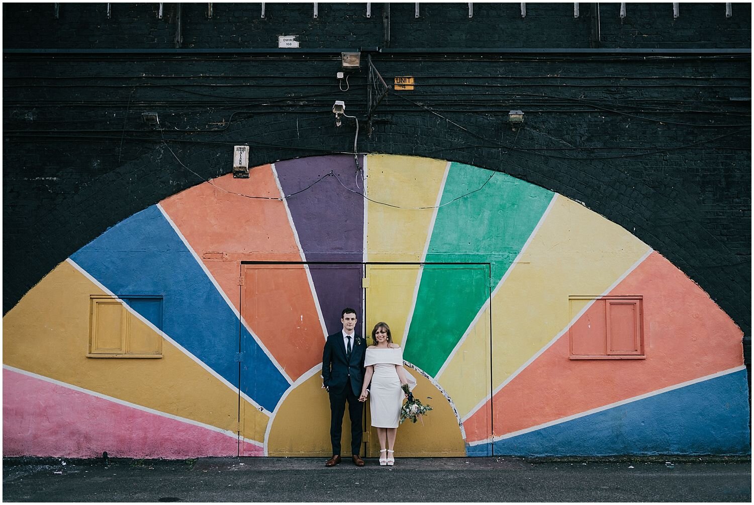 Hackney Central wedding photo with rainbow