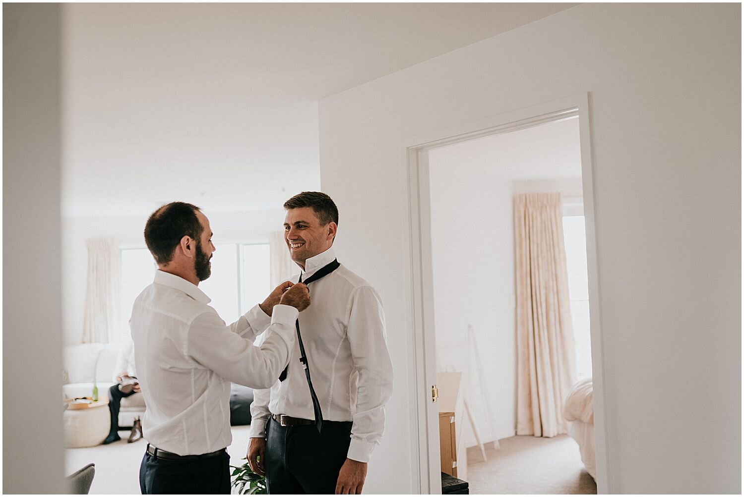 Groom getting ready for wedding in Auckland