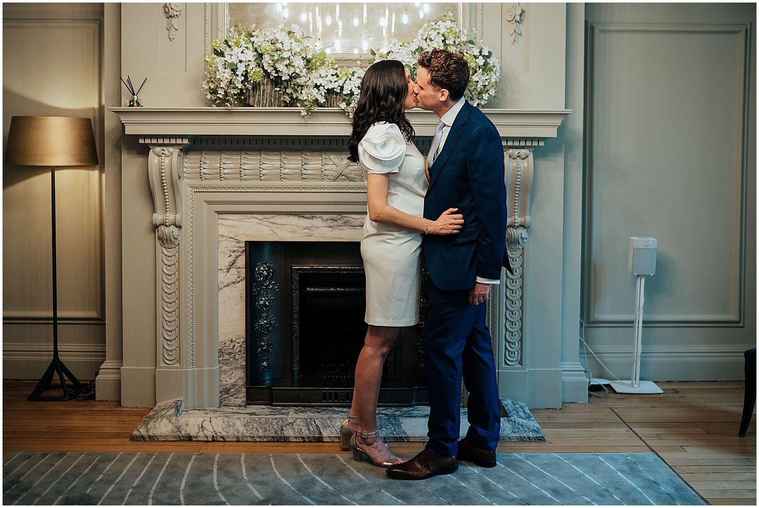 Marylebone Town Hall wedding photo first kiss in Soho Room