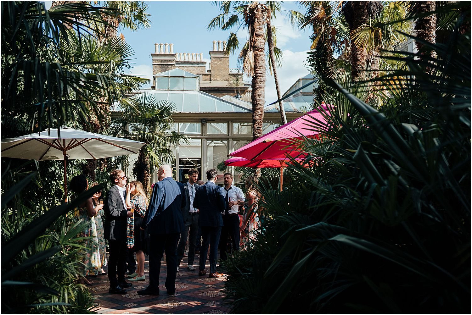 Guests mingling outside conservatory