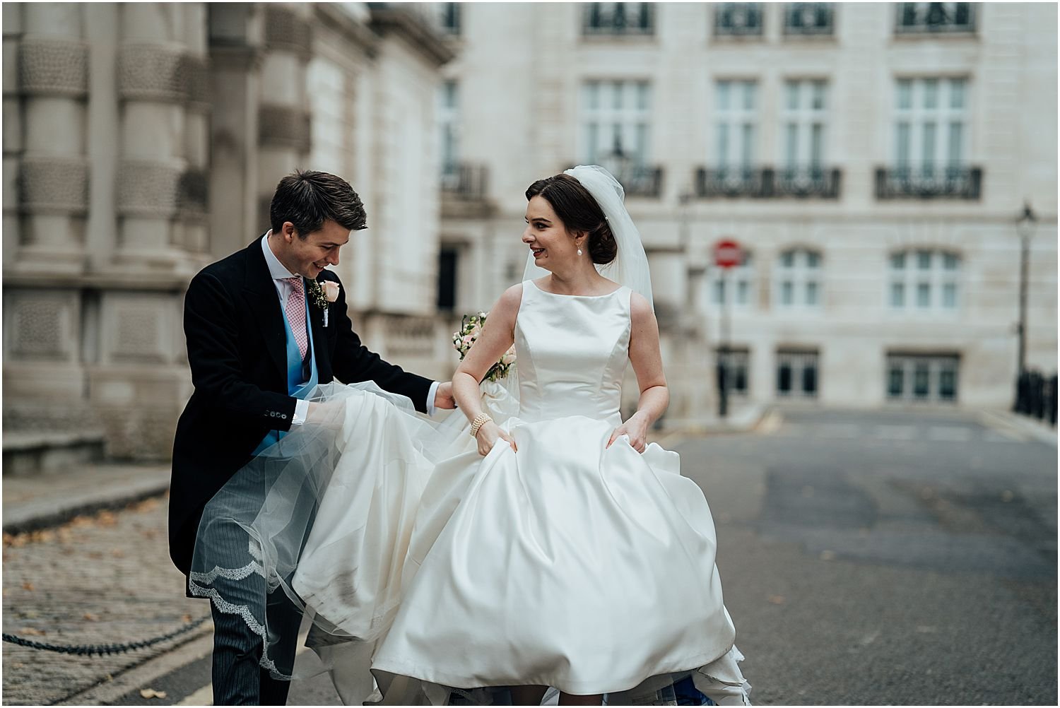 Bride and groom walking in London 