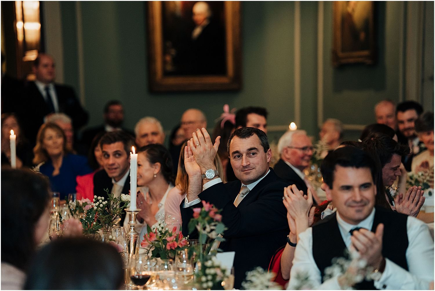 Wedding guests clapping 