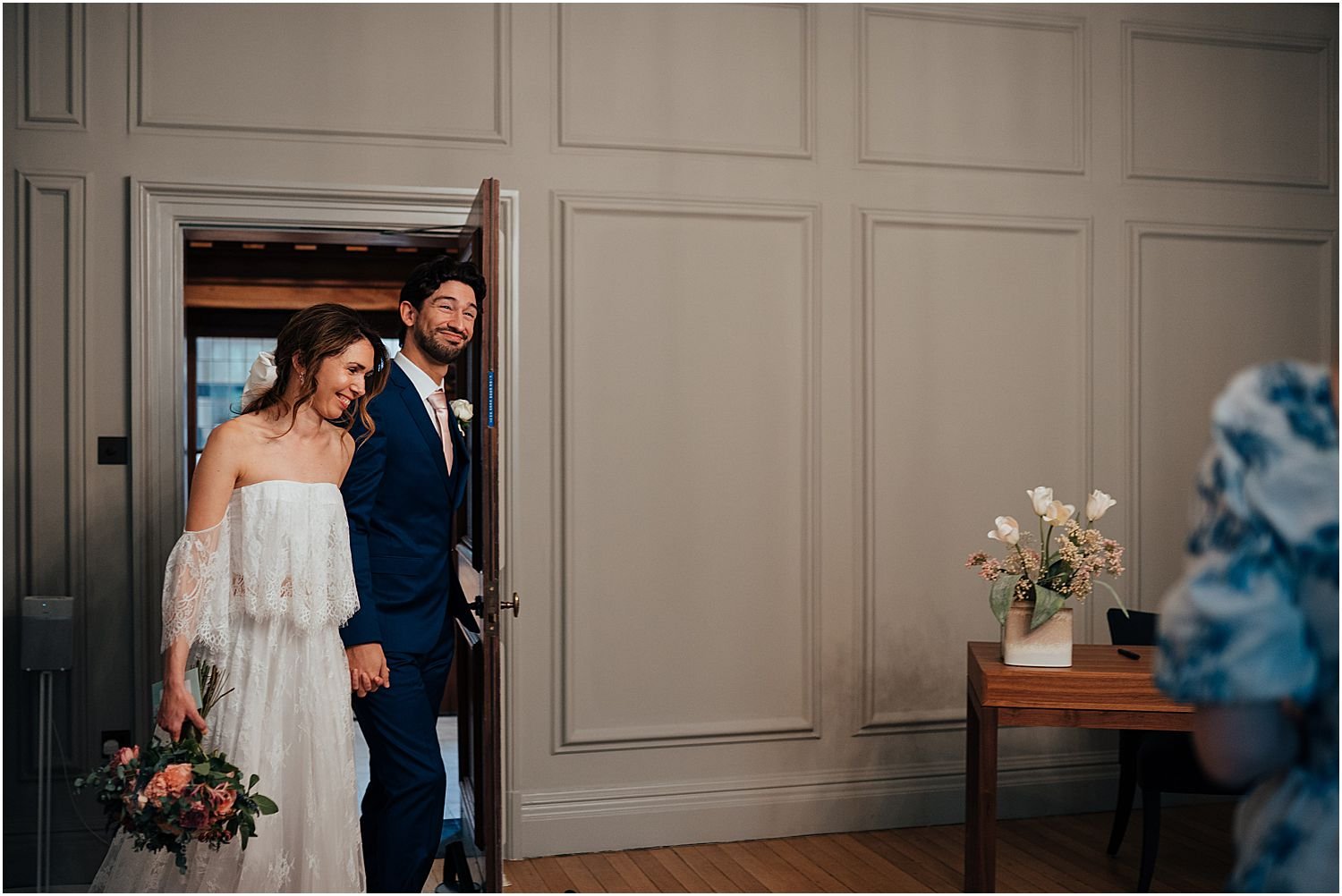 Bride and groom entering Soho Room