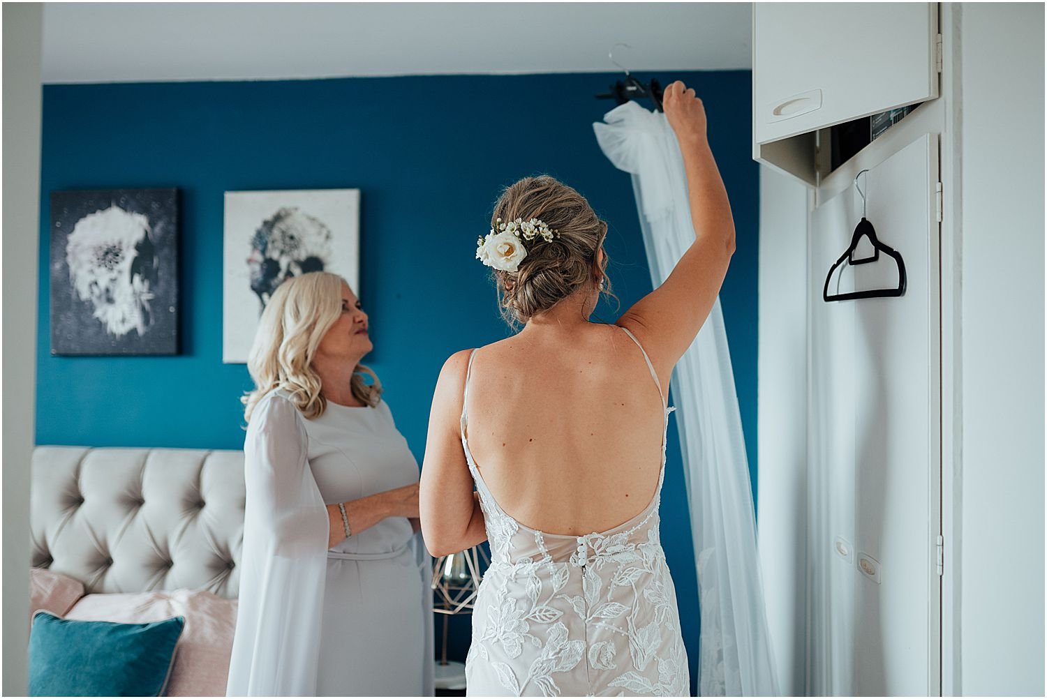 Bride getting dressed for her wedding day