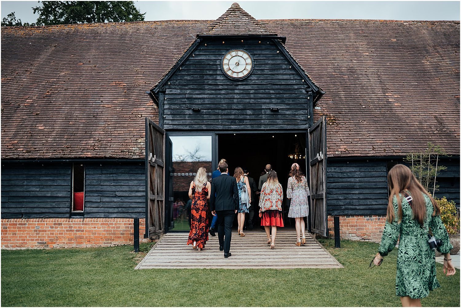 Wedding guests entering Lains Barn