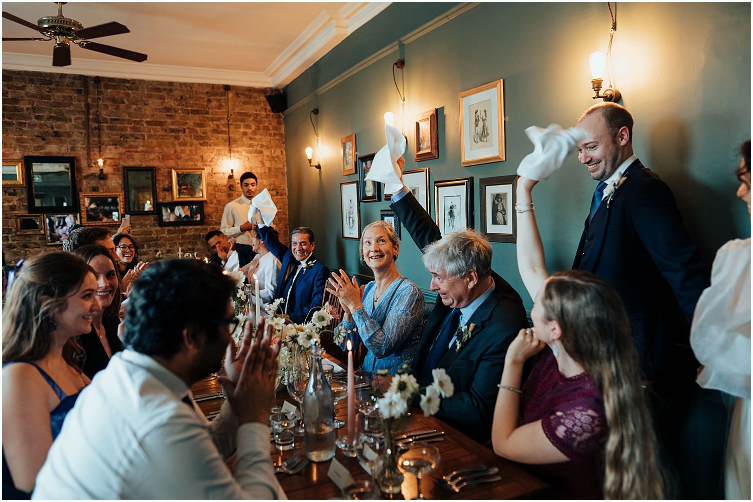 Guests greeting wedding couple in dining room at Lady Ottoline Pub