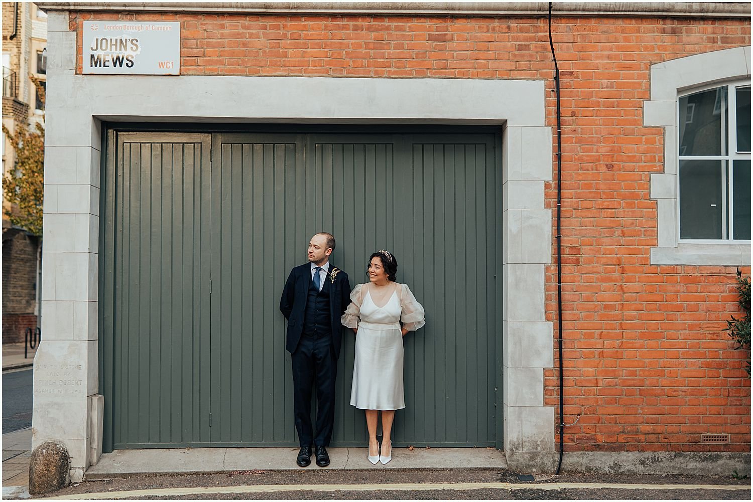 Wedding photos of couple on streets in Clerkenwell