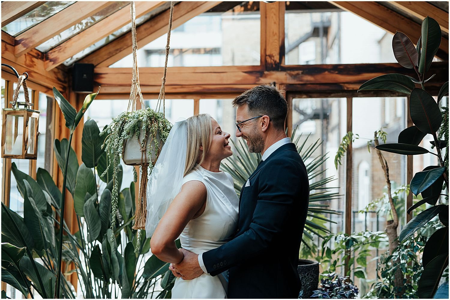 Bride and groom in greenhouse at Mandrake hotel