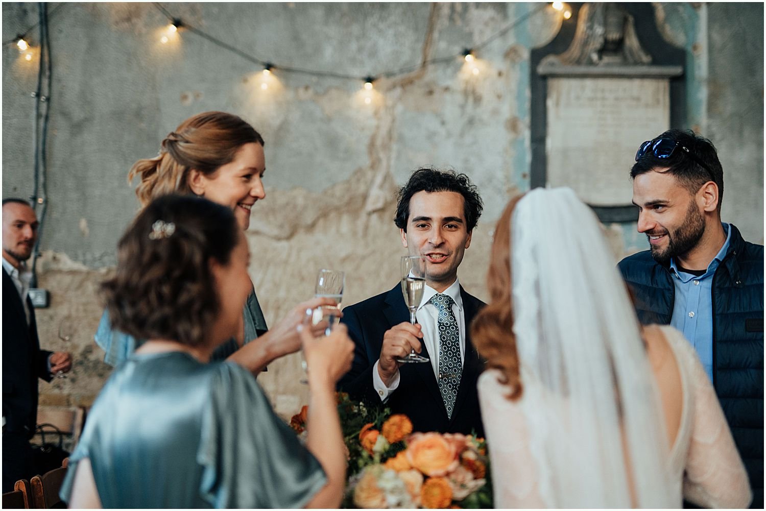 Bridal party toast in Asylum chapel
