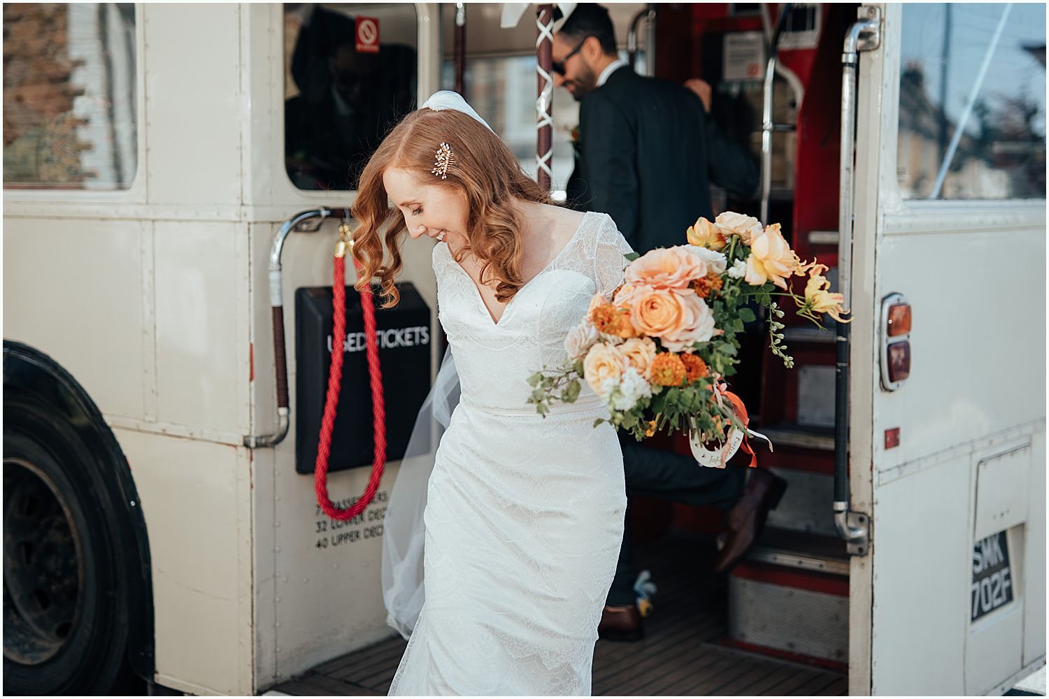 Bride leaving wedding bus