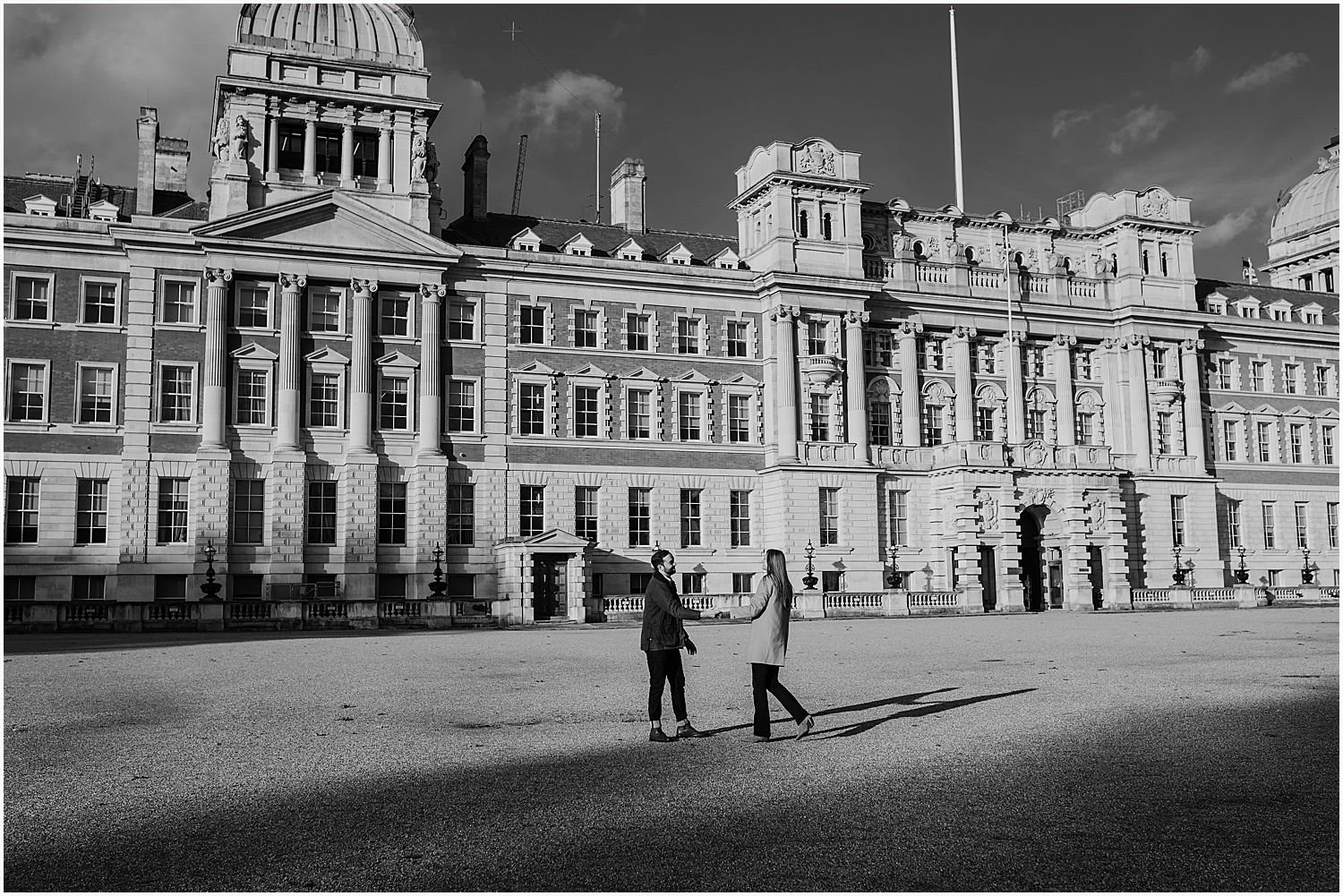 Engaged couple dancing in Westminster