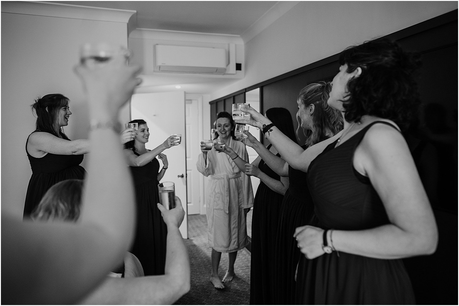 Bridesmaids toasting at Mercure Hawkswell Hotel in Iffley