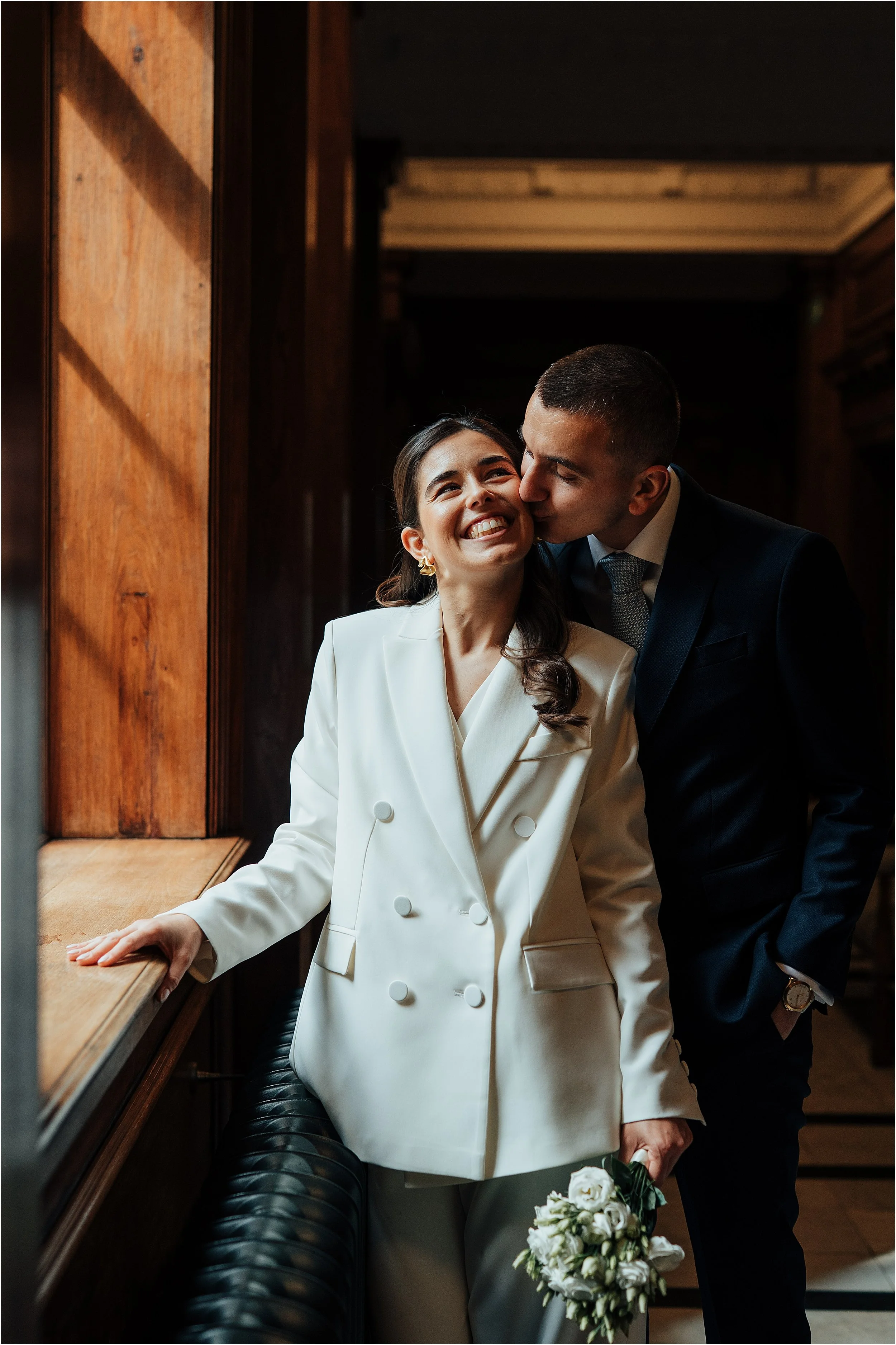 Couple standing by window at the Old Marylebone Town Hall