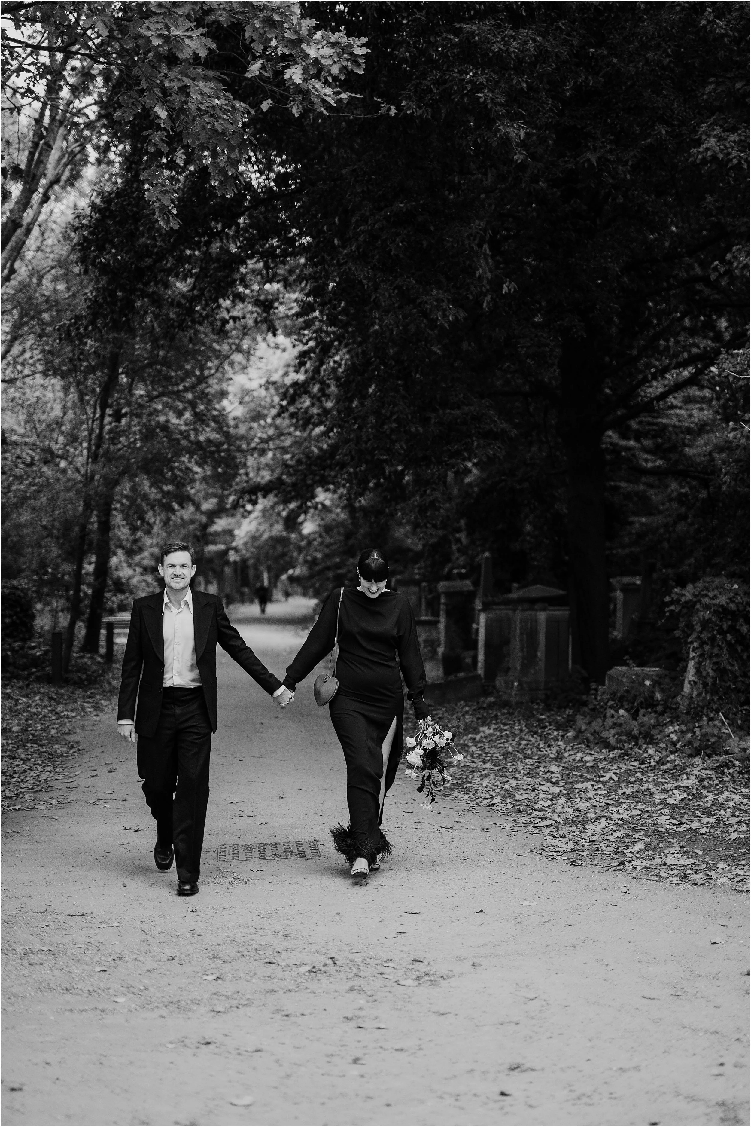 Bride and groom walking up to chapel