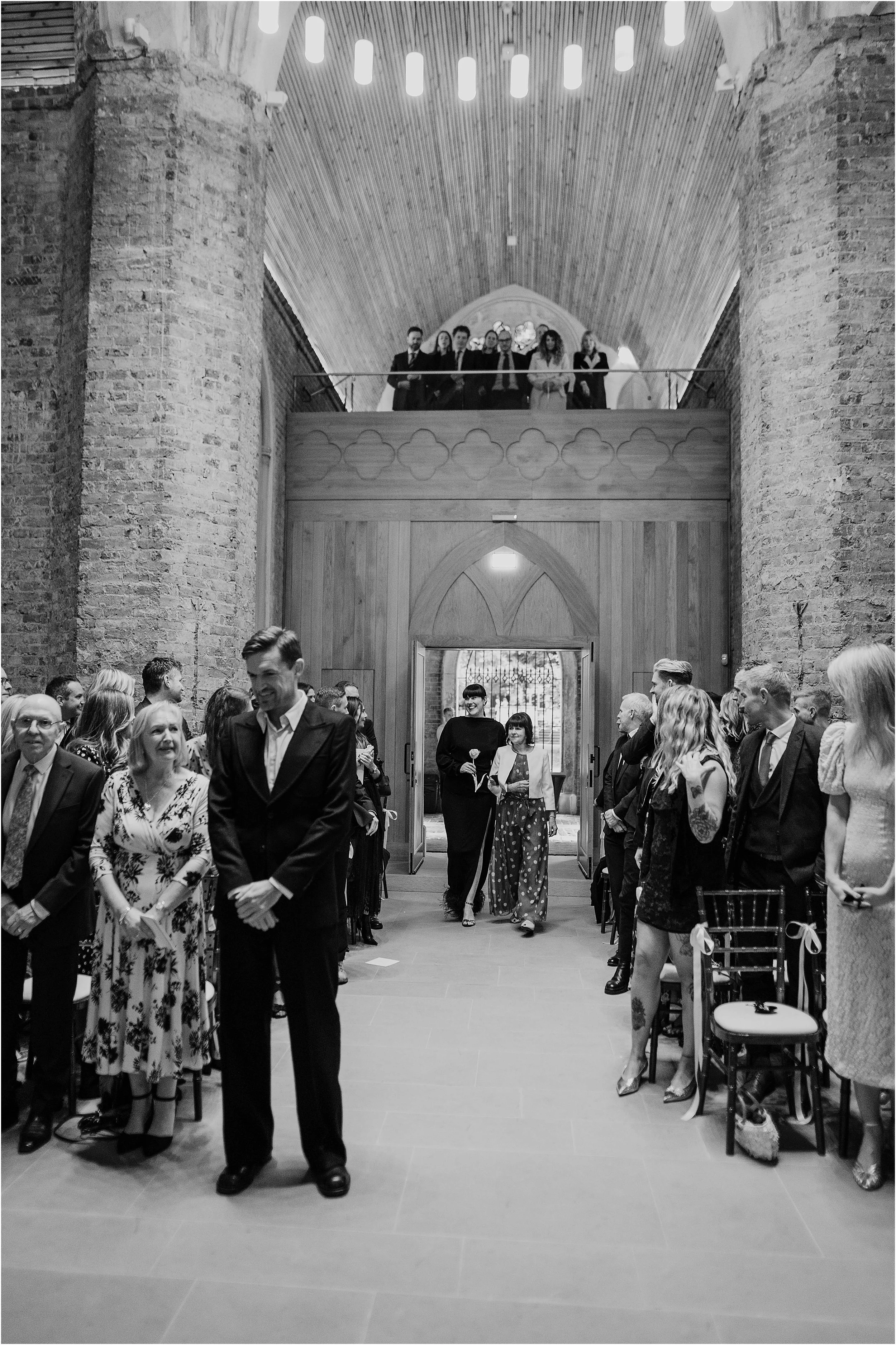 Groom waiting for bride to walk down the aisle