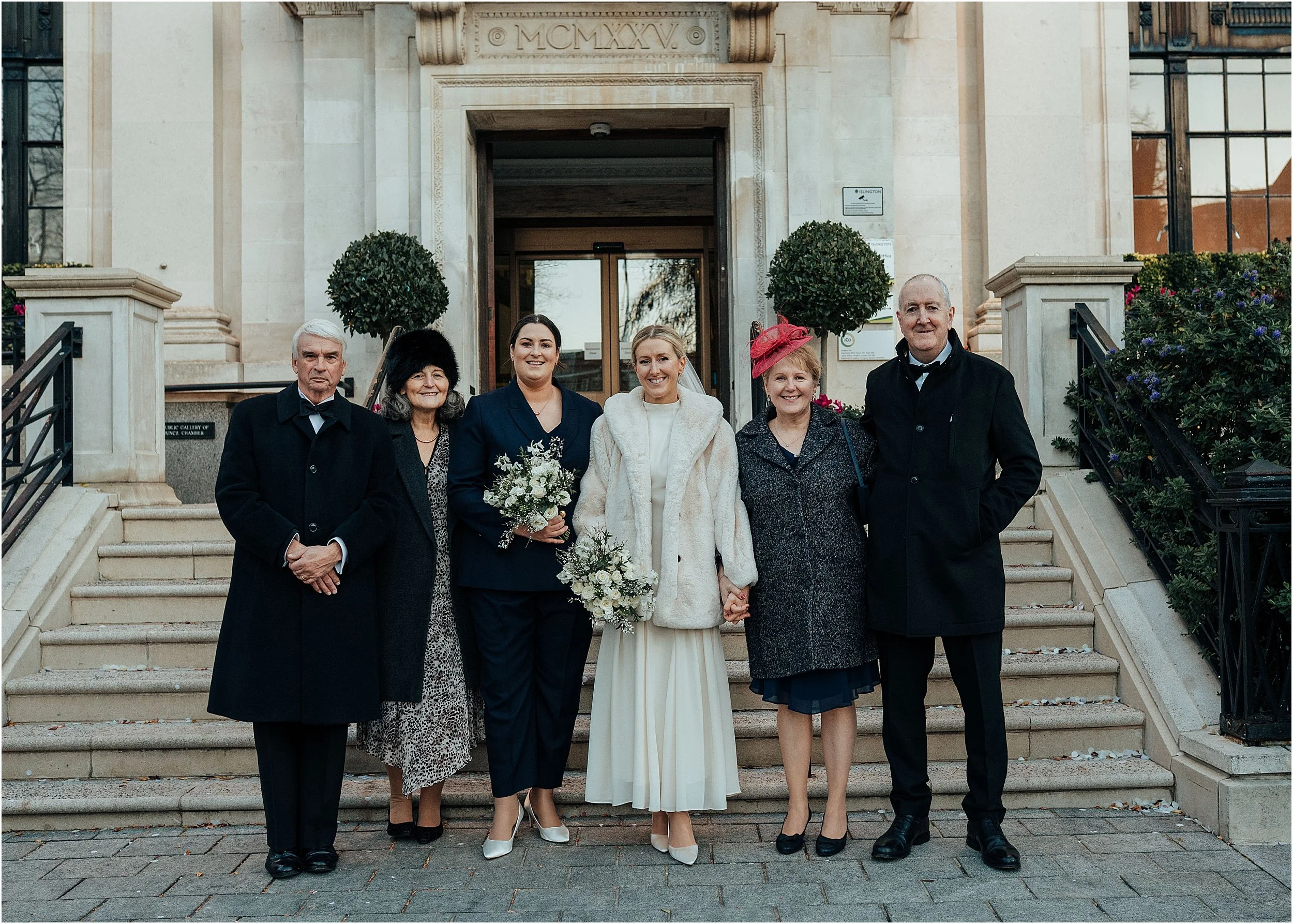 Family group photo outside Islington Town Hall
