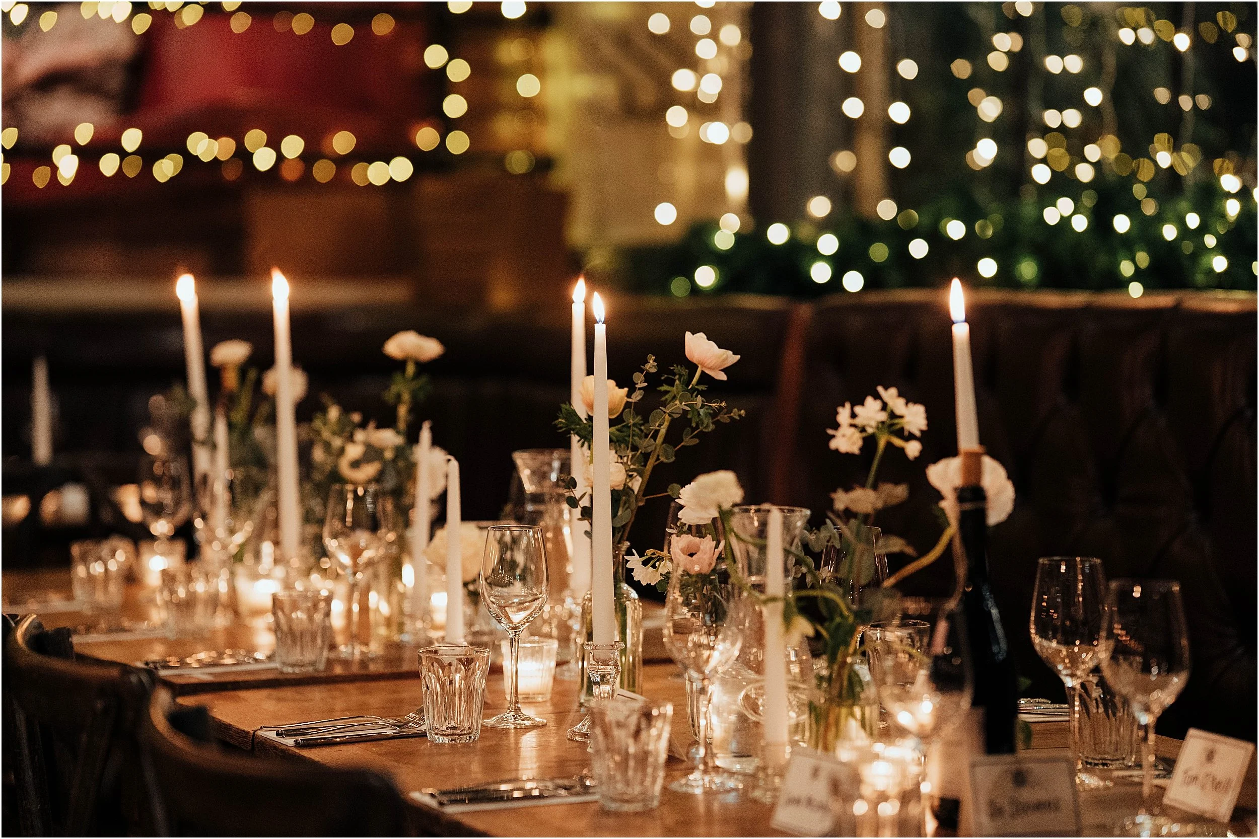 Candlelit tables for Christmas wedding reception at Depot N7