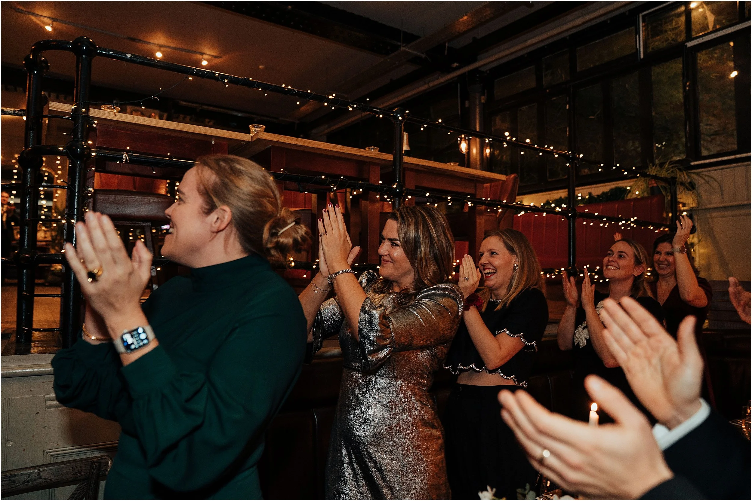 Wedding guests clapping