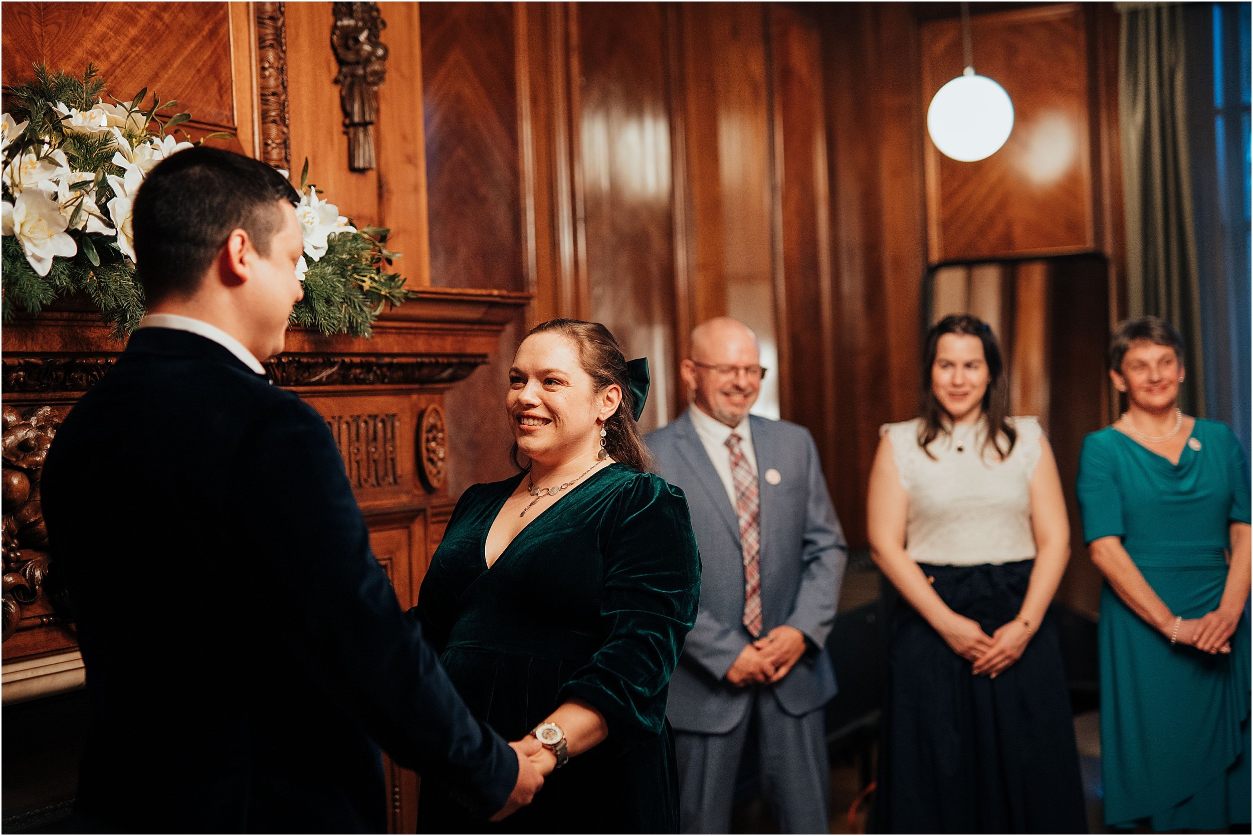 Bride and groom standing in Paddington Room at OMTH 