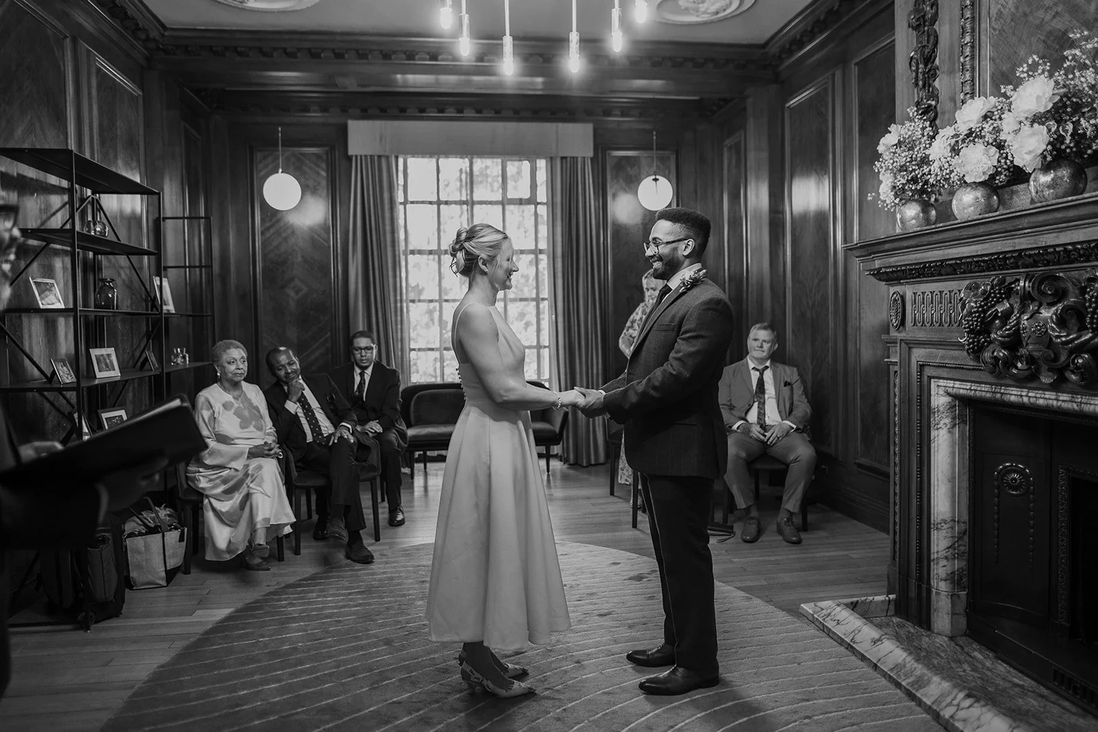 An intimate wedding ceremony taking place in the Marylebone Room