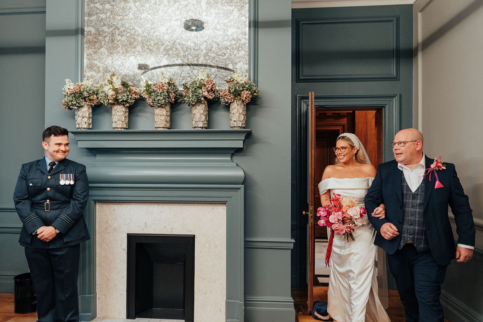 Bride entering the Knightsbridge room at Marylebone Town Hall with father