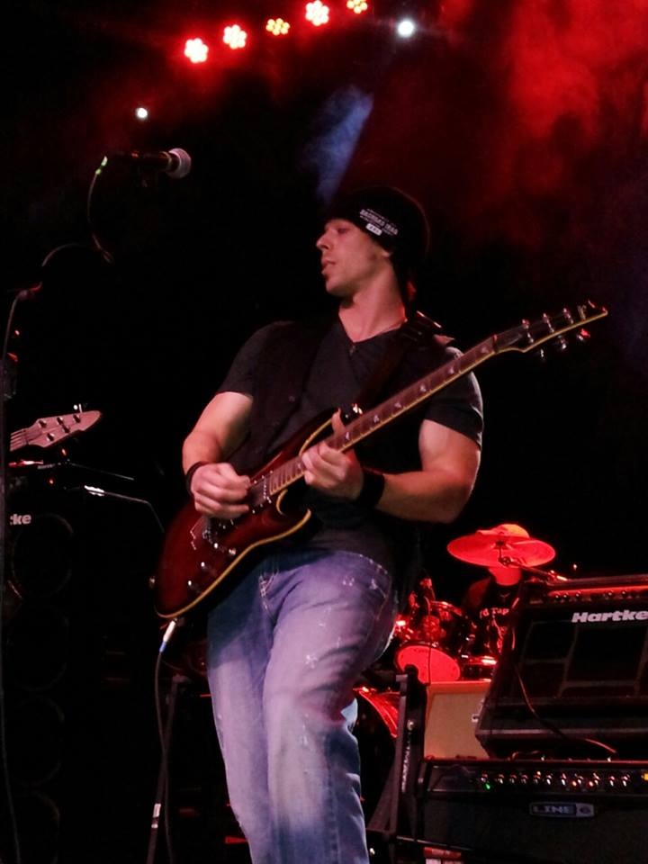 Sean Guerrero performing live on guitar at Ziggy's