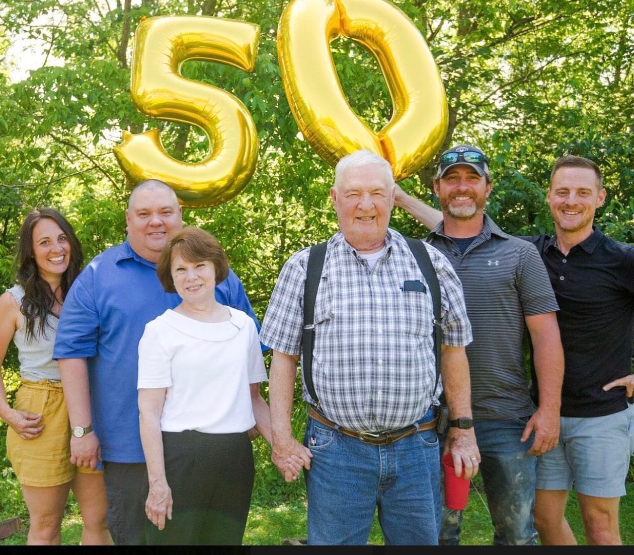 My siblings and I celebrating with my parents on their 50th anniversary.