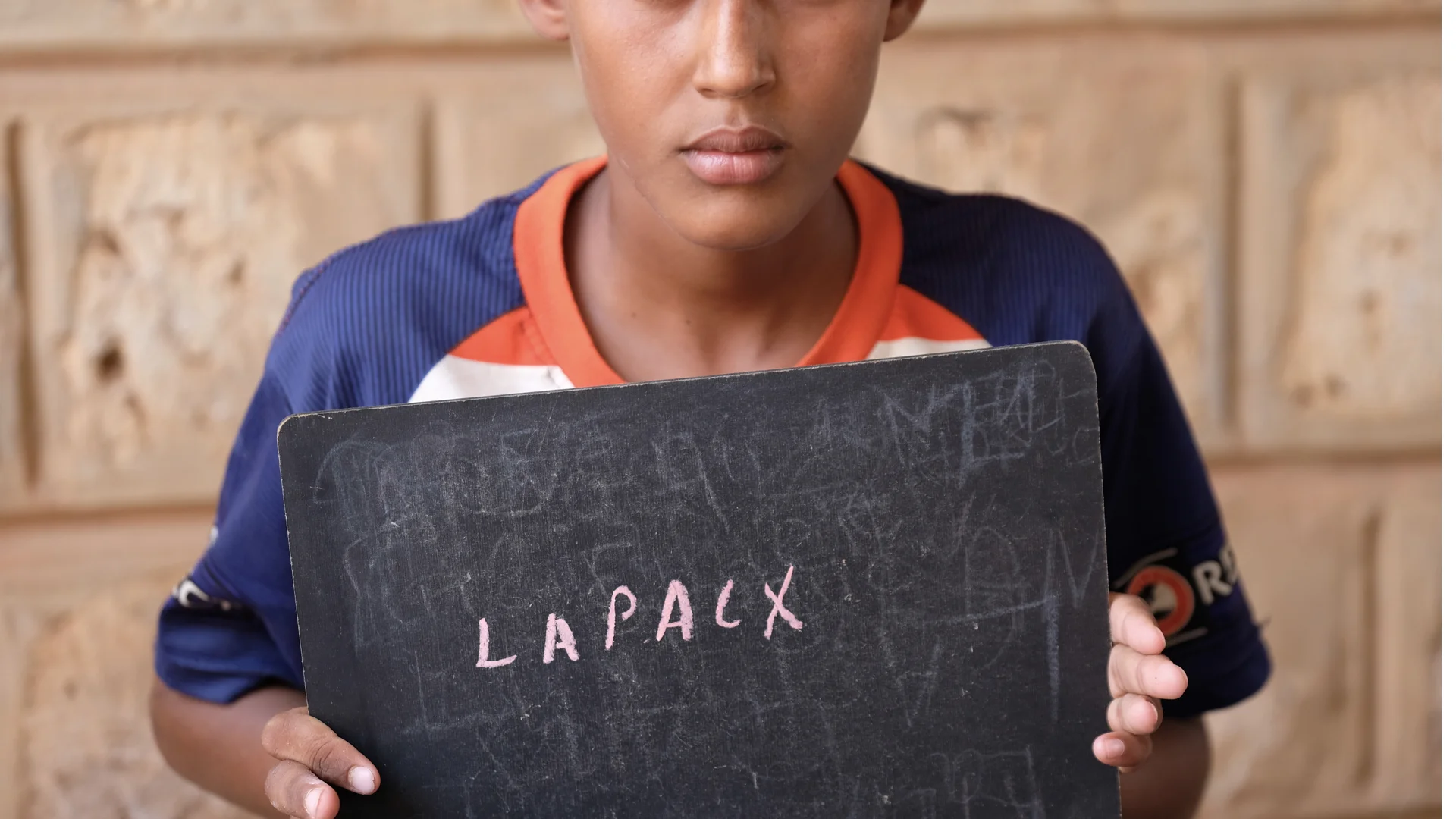 “PEACE’ writes Ahmed. His father was killed a month ago in a raid by bandits. They stole everything that he owns. His wish is to go back to what it was like before the crisis, when he looked after the animals for his father. Now he’s the oldest boy …