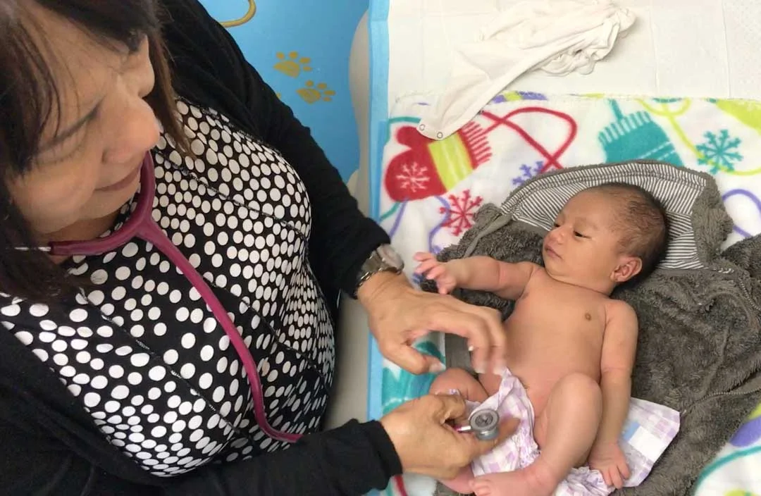 Dr Gancia meets her latest patient as she comes in for her first check up at two weeks old. Getting mothers in for regular appointments allows the team at Majuro Hospital measure the weight, track progress and intervene early if there are signs of m…