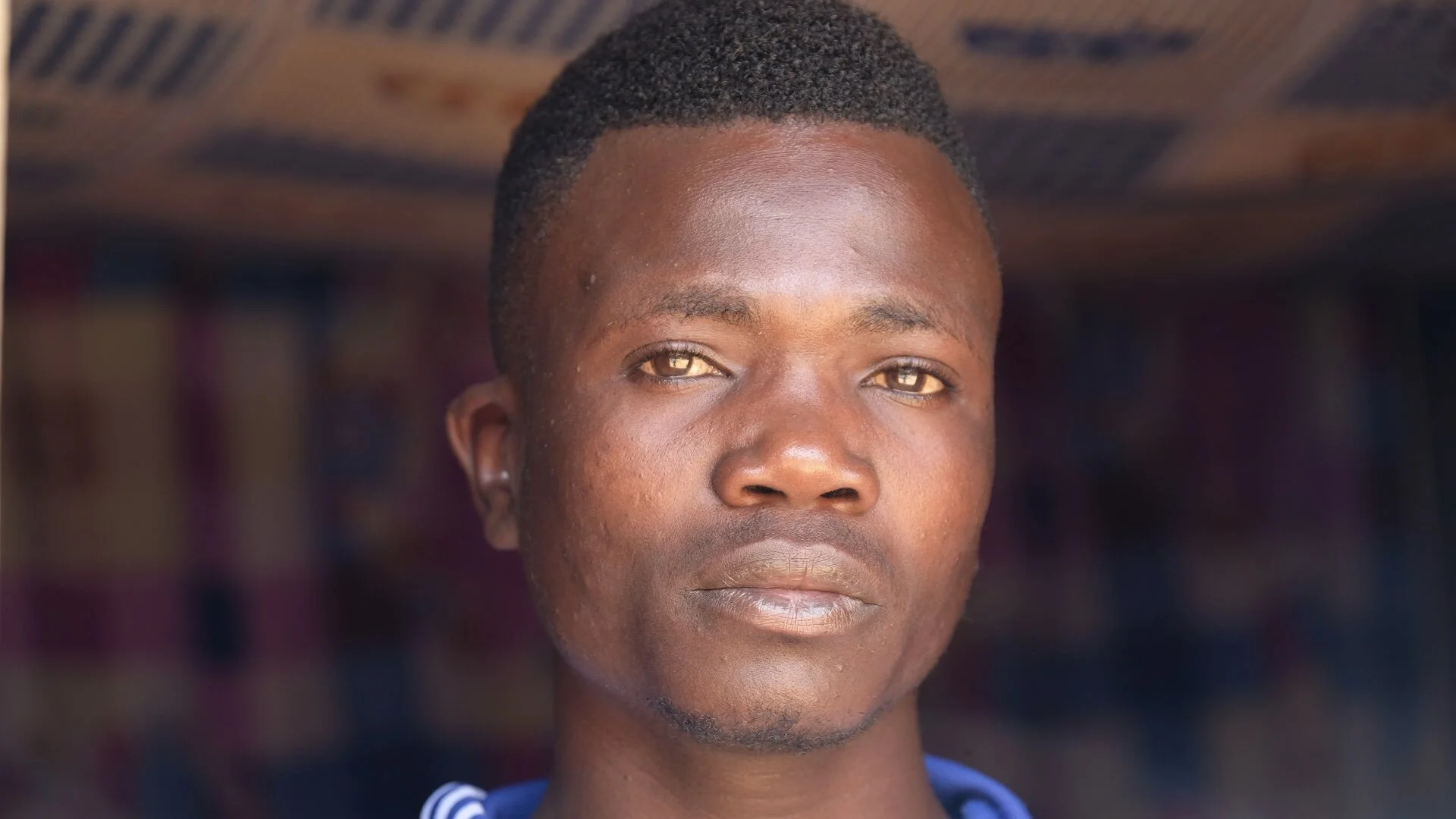 Moise is an Ebola survivor but his story is complex. When he got sick, his parents refused to take him for treatment because they didn’t believe in the virus. As he got worse, he ran for help and was treated at the nearby center. He made a full reco…