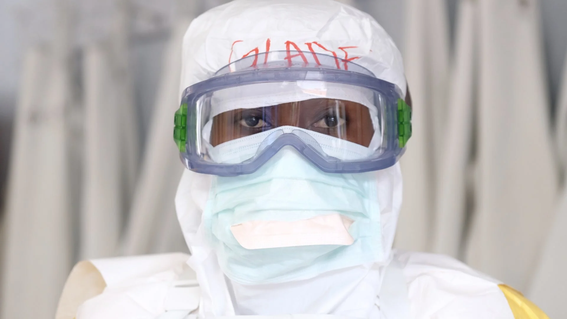 Gladys works in the red zone at the Ebola treatment center in Katwa near Butembo. Everyday she gets suited up with multiple layers of protection so she can go in and disinfect the patients rooms. She says she worries about catching the disease, even…