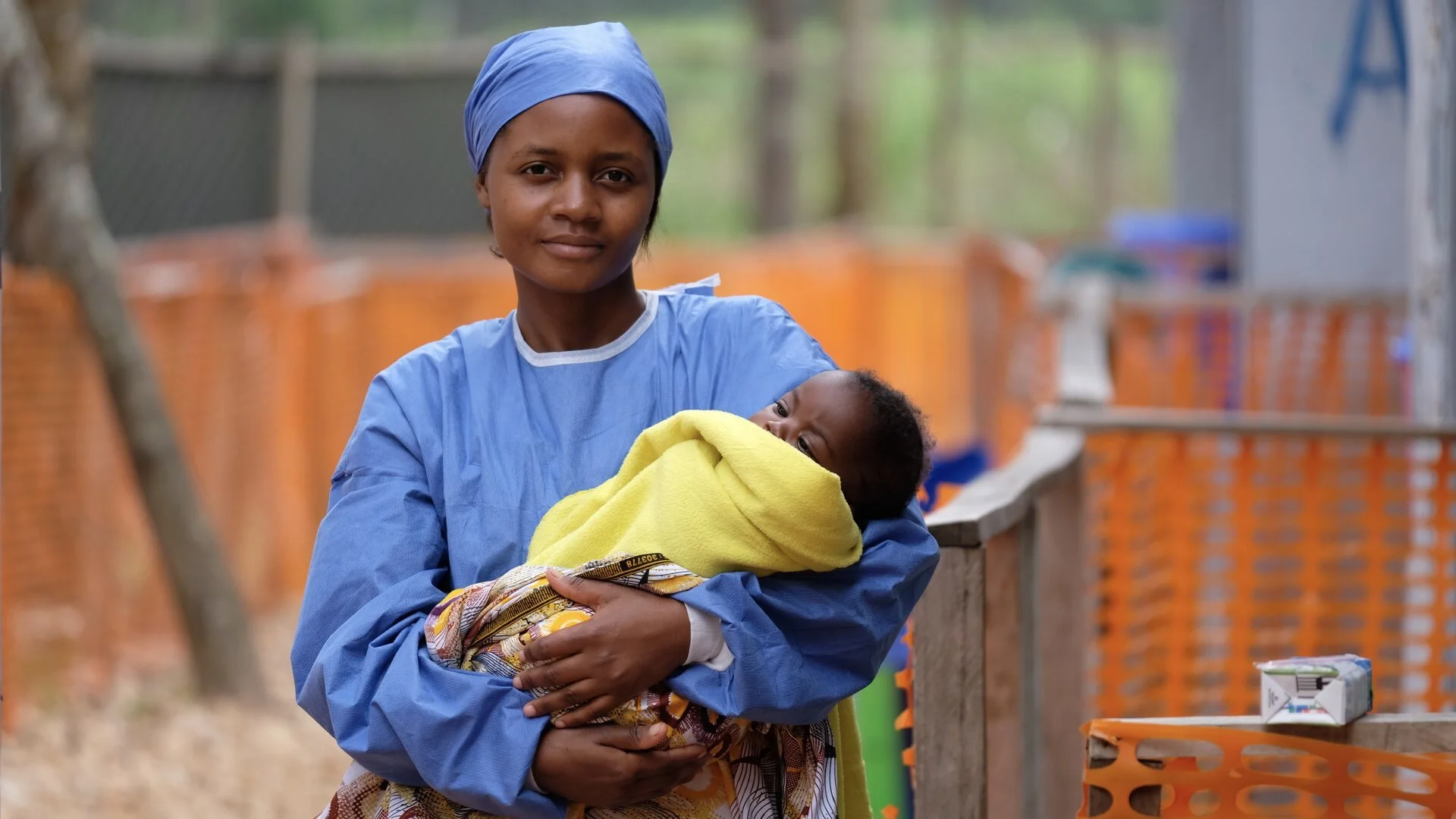 Francine is an Ebola survivor who now looks after children in the treatment center. Children suspected of having Ebola are separated from their parents so Francine is there with cuddles and care.