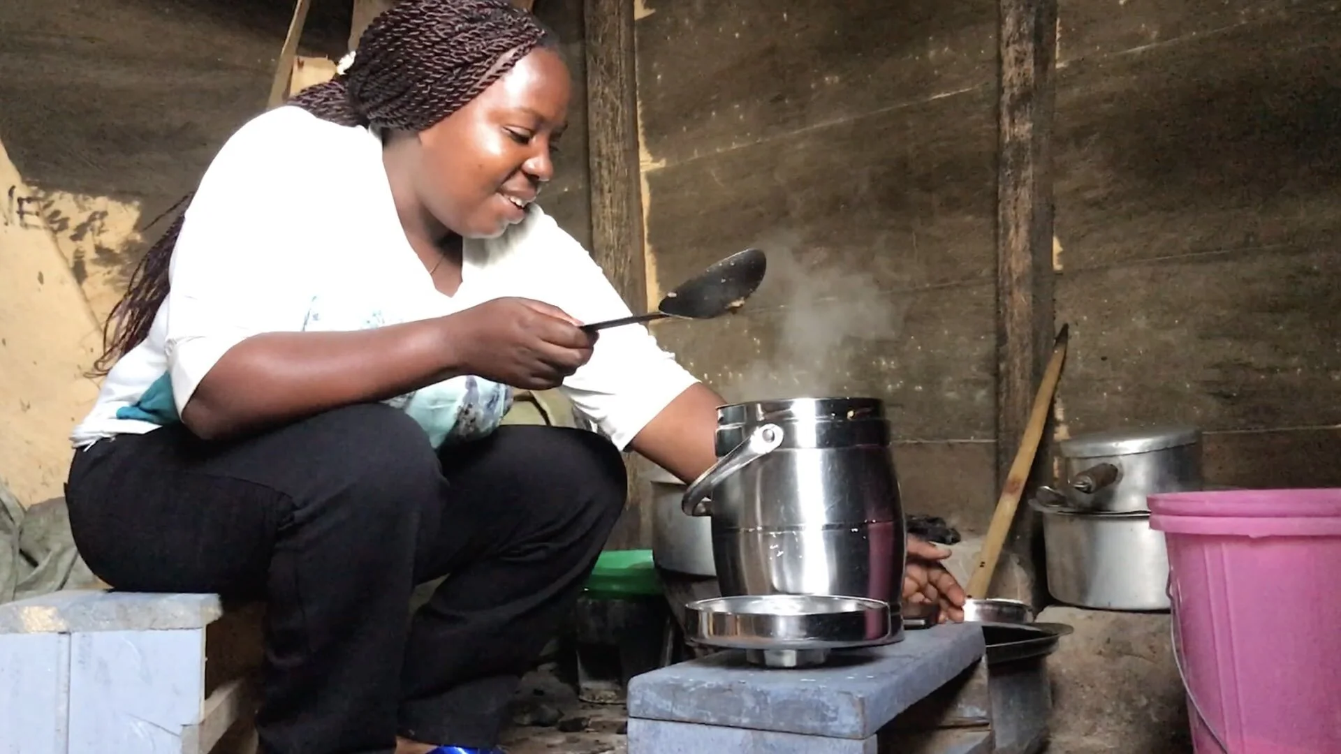 Even after hours, Edwige is still looking after others. In her kitchen, she’s making soup to drop off for a friend who isn’t well. She’s proud to tell people she’s an Ebola survivor as she travels through her neighbor. “It helps everyone understand …