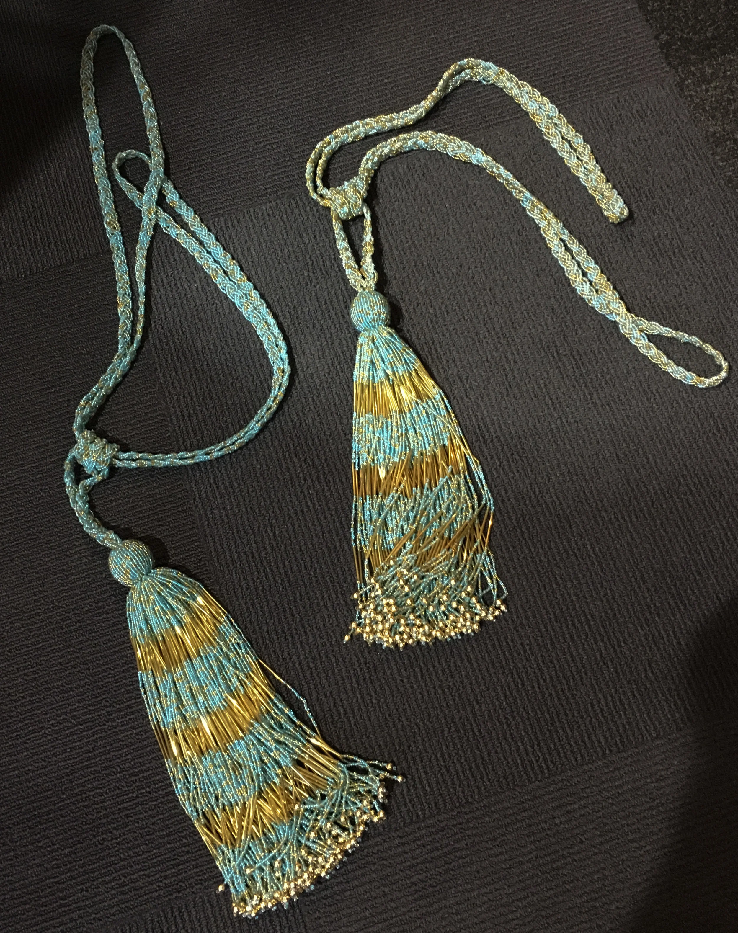 Turquosie fasten constructed from bead.jpg