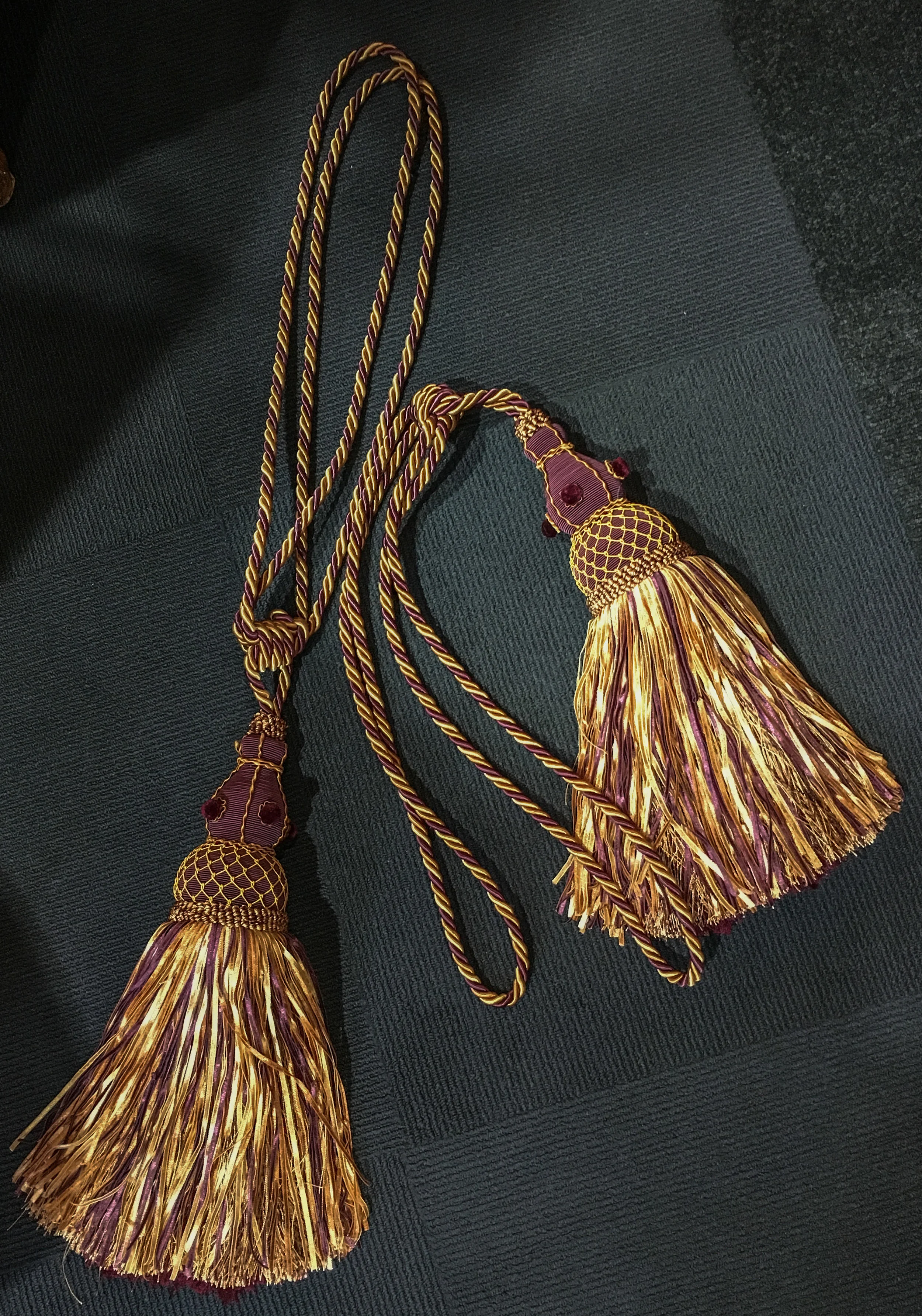 Pair of large tassels in purple and gold rope.jpg
