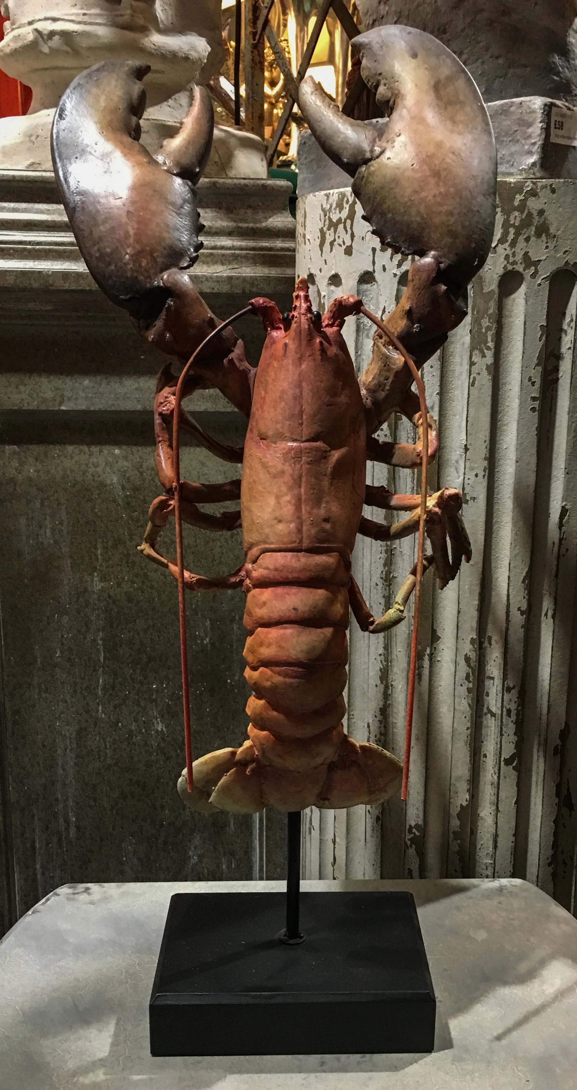 Large lobster ornament on a stand.jpg