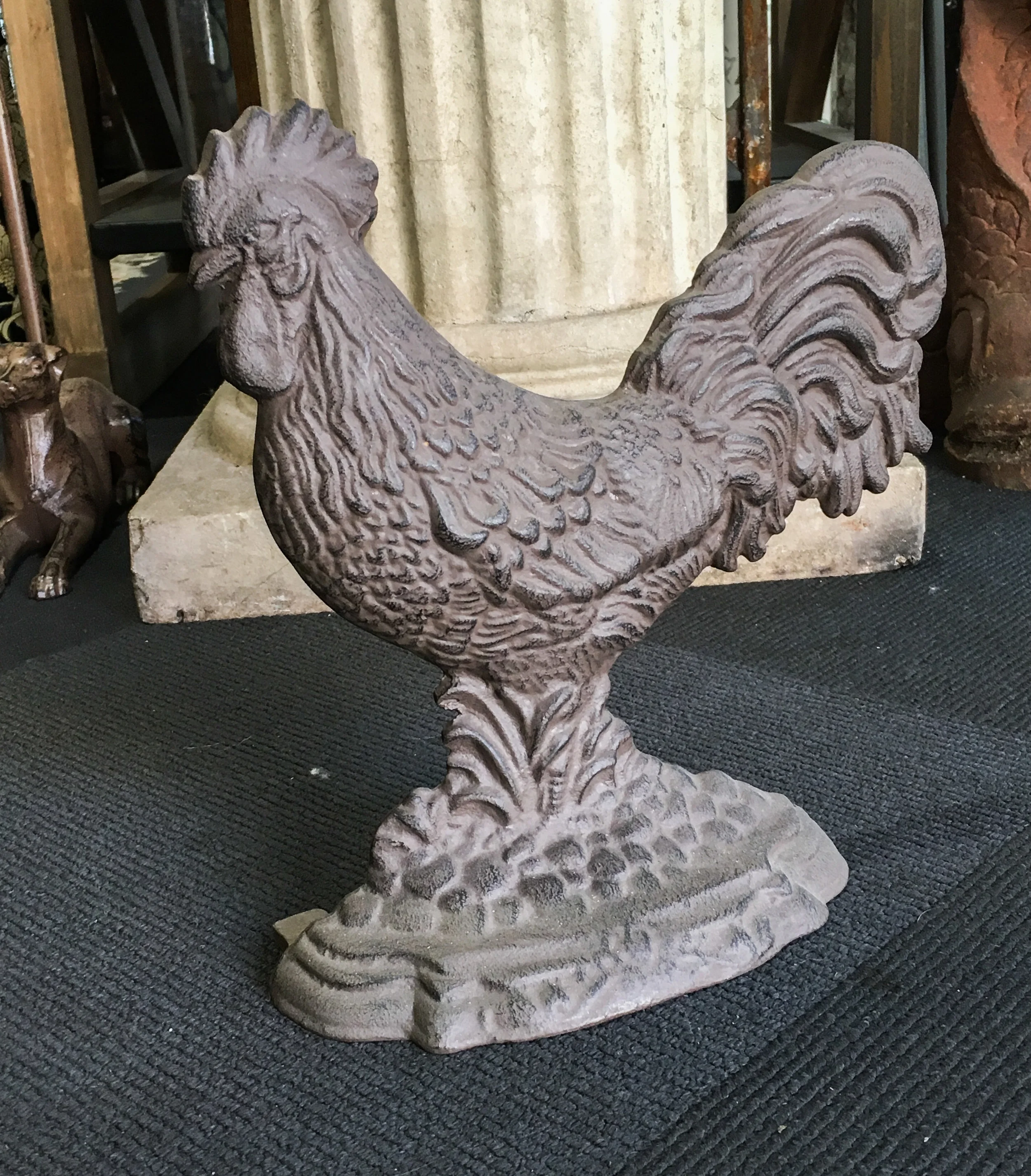 cockerel doorstop in cast iron.jpg