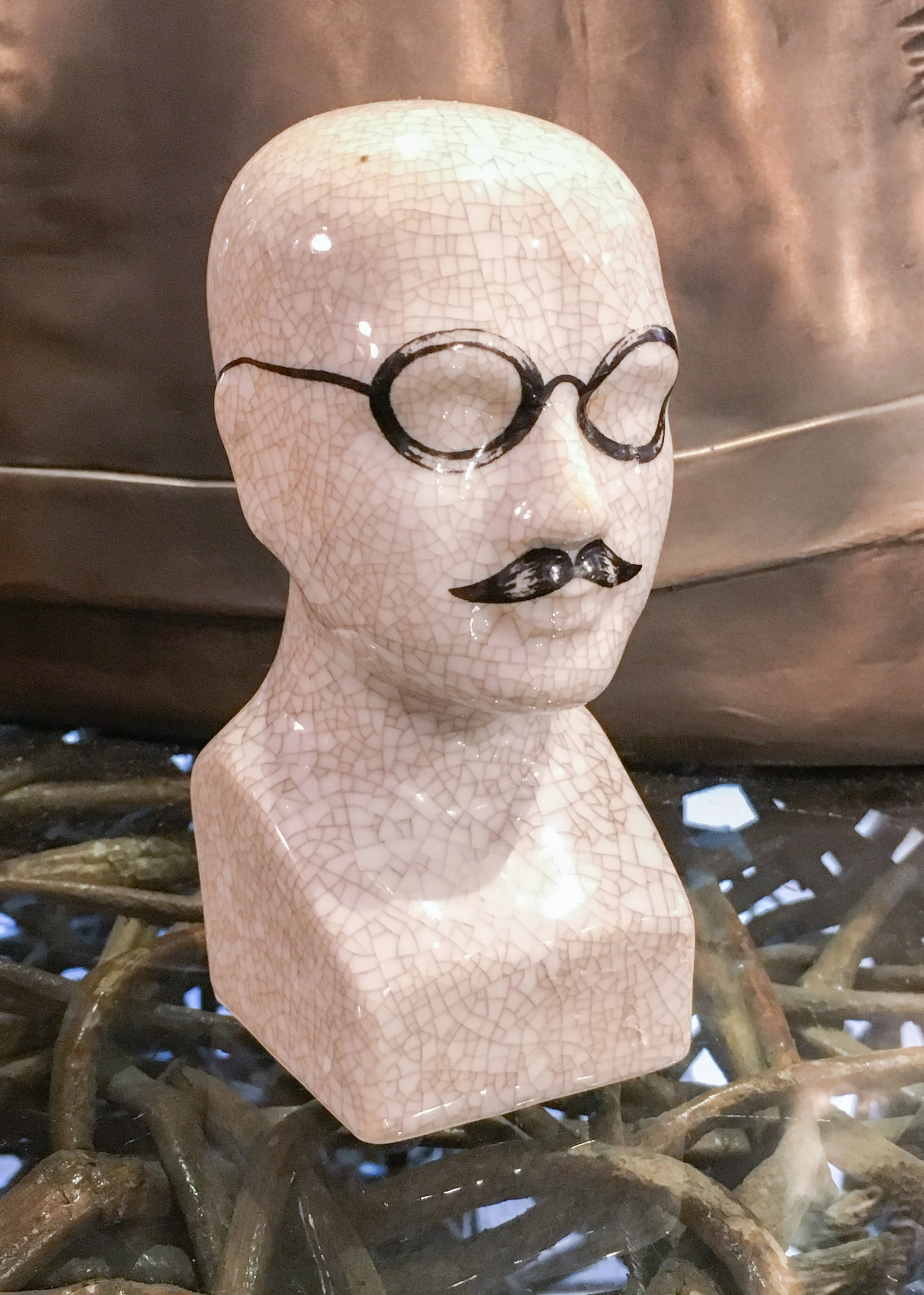 small ceramic head with moustache and spectacles.jpg