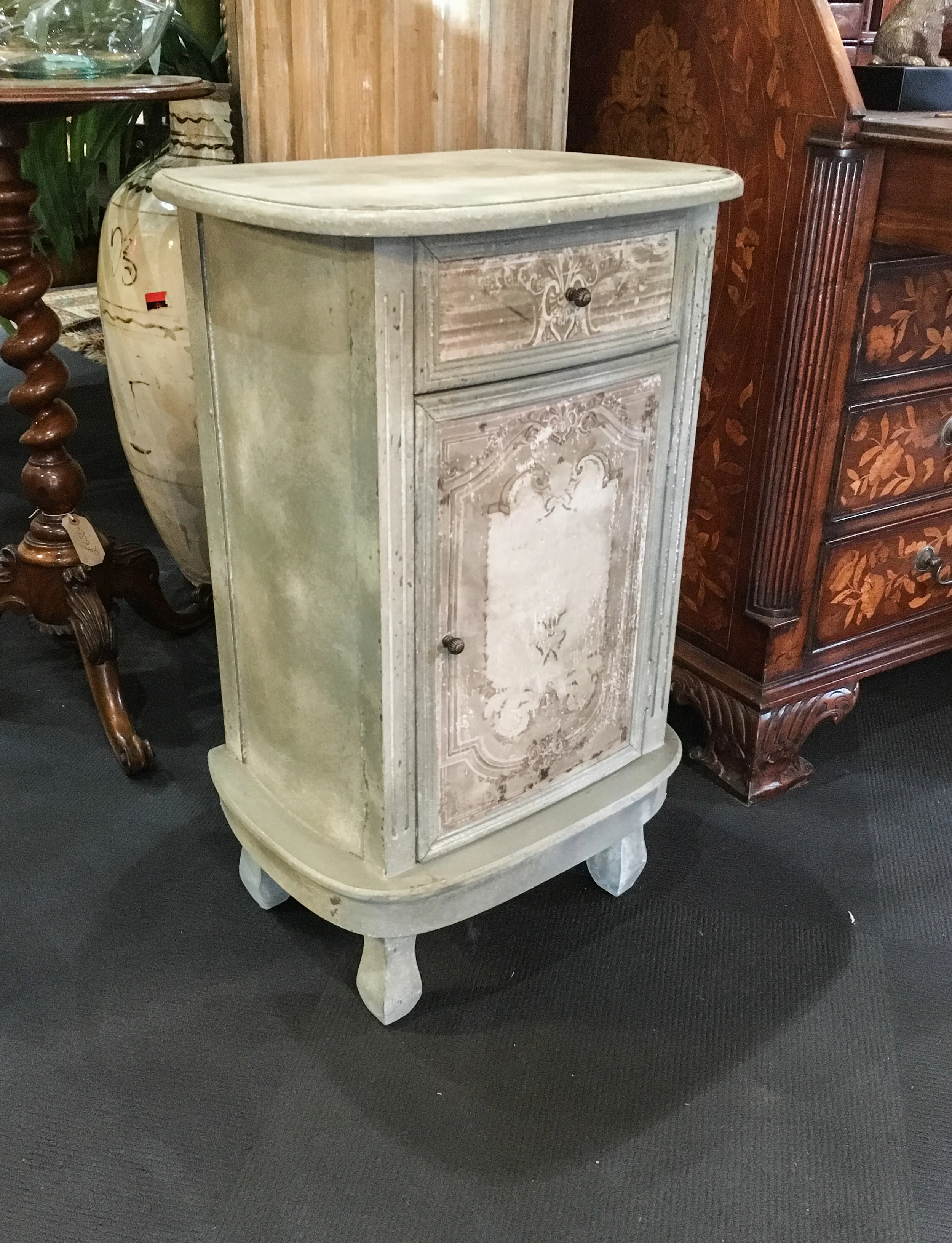 A pretty bedside with drawer and cupboard
